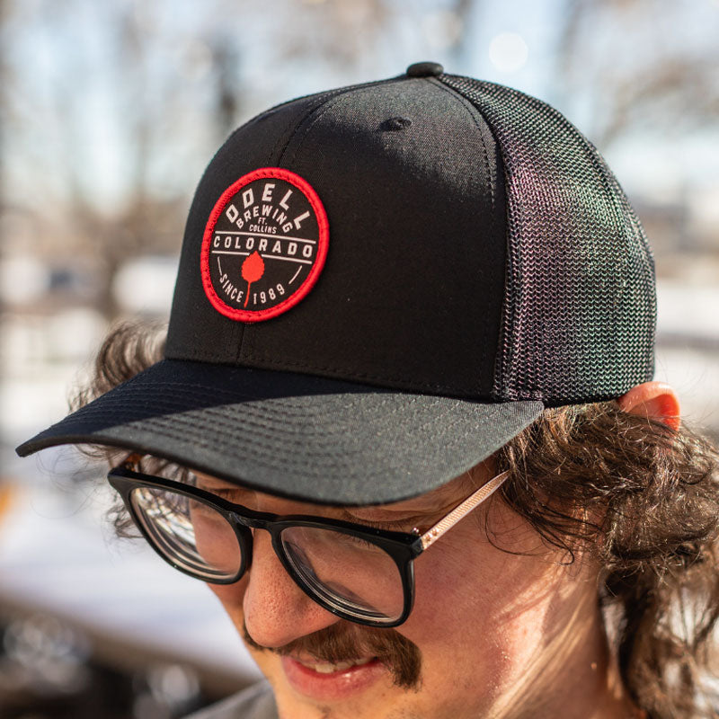 Black Richardson hat with circle badge logo