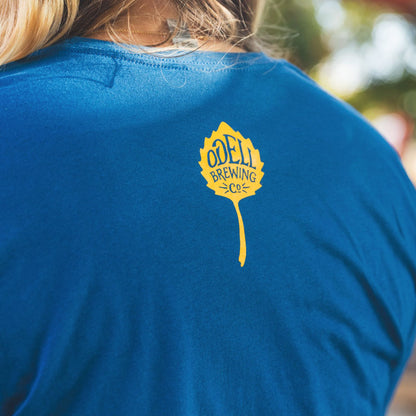 Back of Colorado Flag Blue Tee Shirt with Gold Odellleaf Logo