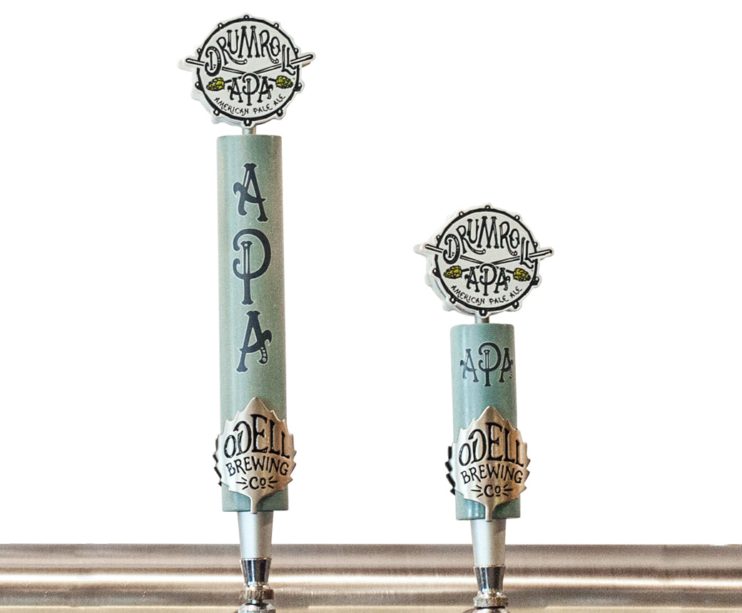 A tall and short tap handle with the Odell Drumroll logo