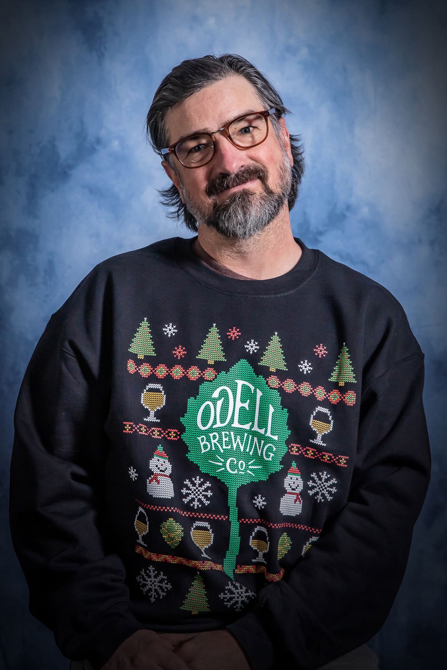 Holiday sweater with Odell logo