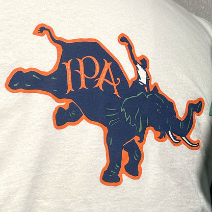 Close up of IPA logo on ringer shirt