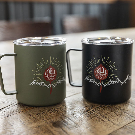 Miir mug with Odell Leaf logo, mountain range and rays