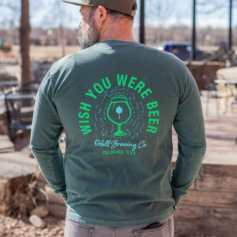 Back of green t-shirt that says Wish You Were Beer