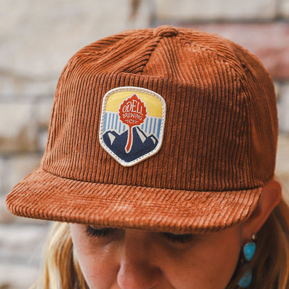 Brown corduroy hat with Odell patch on front